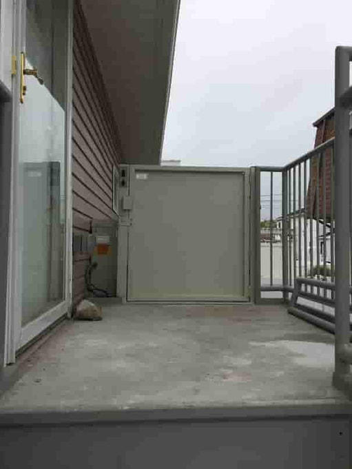 outdoor vpl at top of stairs on deck